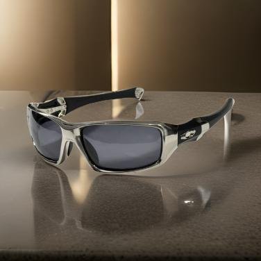 A pair of Oakley sunglasses resting on a table in a well-lit room, showcasing their sleek design and style.