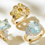 Five rings featuring various colored stones, showcasing a vibrant array of hues and styles.