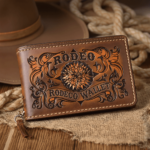 Leather wallet featuring a cowboy's name and the word "rodeo" embossed on the front.